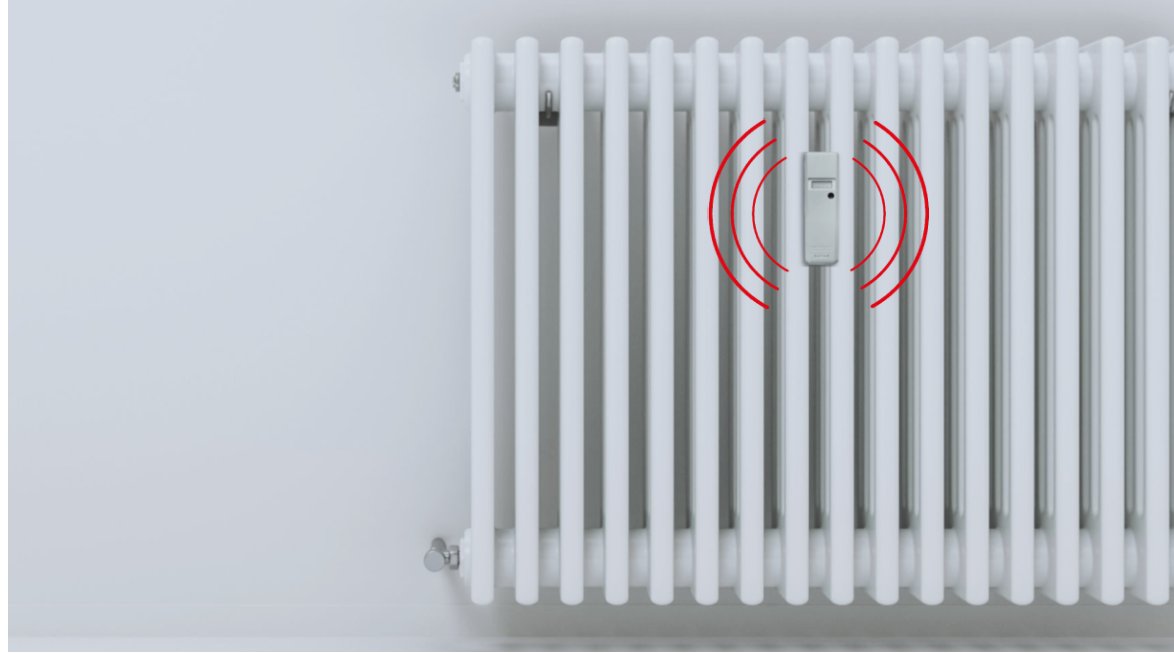 Repartidor de costes de calefacción instalado en un radiador, emitiendo señal inalámbrica para la lectura remota del consumo energético.