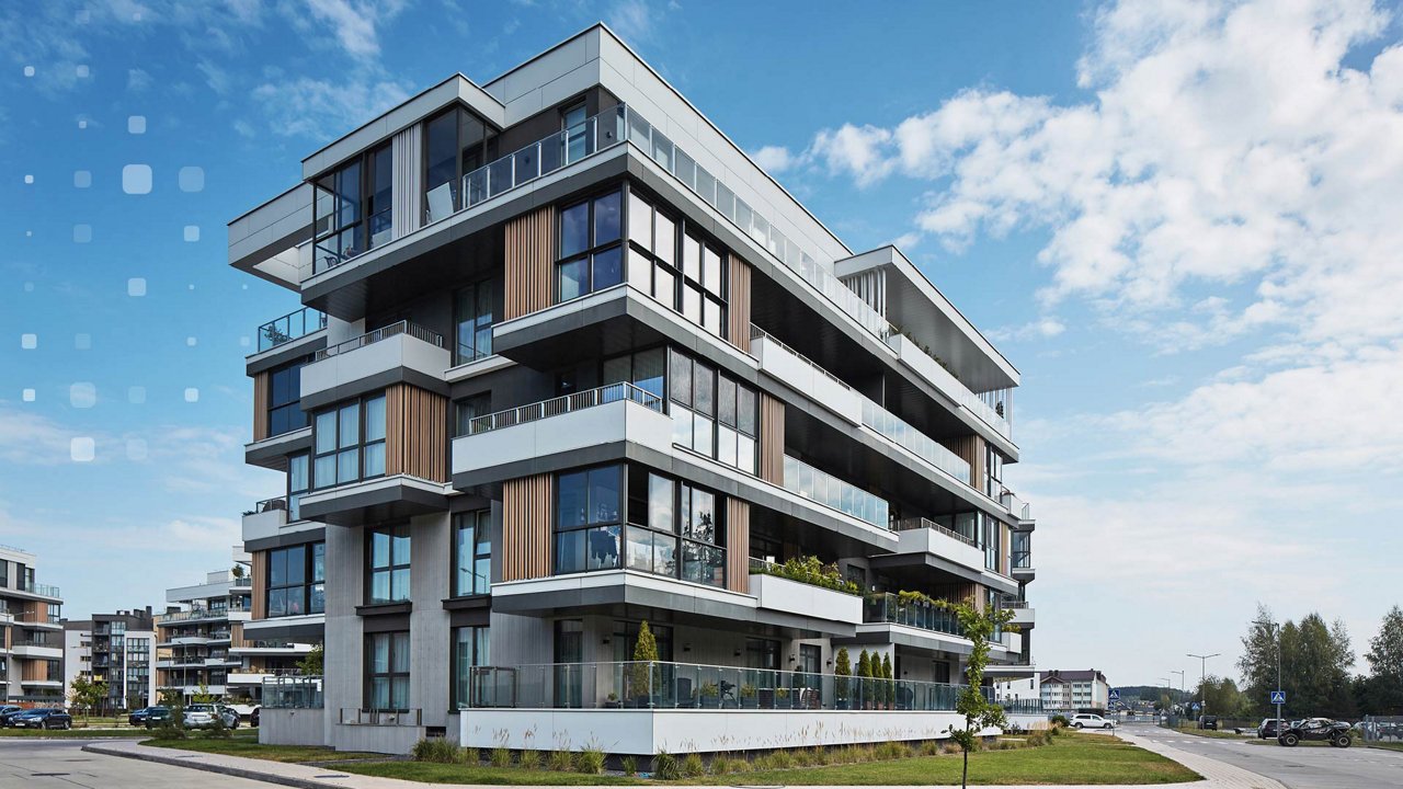 Moderne Wohnanlage mit mehreren Gebäuden.