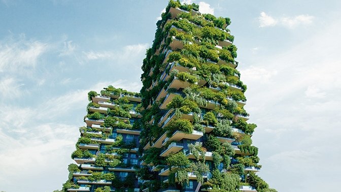 En grønn bygning dekket av trær gir et friskt og naturlig inntrykk, samtidig som den fremmer bærekraft.